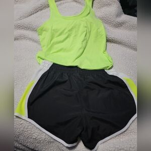 Zone Pro athletic shorts. NWOT. Size S Black, white, and green/ yellow